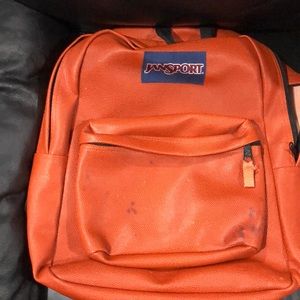 Jansport burnt orange leather feel backpack